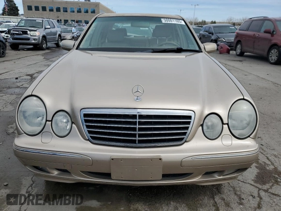 2000 Mercedes-Benz E-Class with VIN WDBJF82J0YX040071, listed as a Copart auction lot 50001165 with 145,638 mi miles and Salvage Title. Bid and sale history available at carsss.com. Image 5.