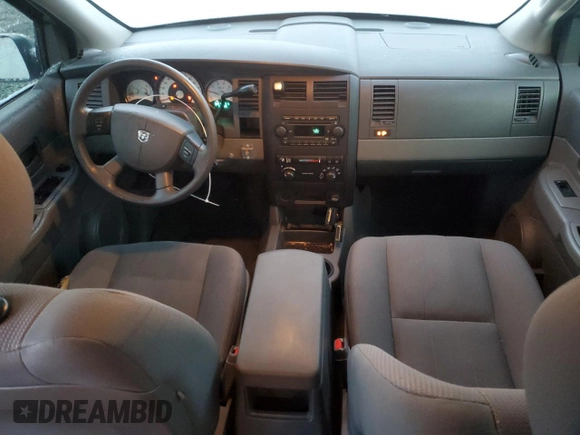 2005 Dodge Durango SXT with VIN 1D4HD38K15F541614, listed as a Copart auction lot 84234524 with 135,588 mi miles and Salvage title. Bid and sale history available at DreamBid. Image 8.