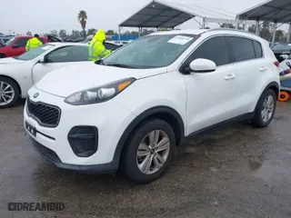 2019 Kia Sportage LX with VIN KNDPM3AC6K7508870, listed as a IAAI auction lot 41808770 with 104,141 mi miles. Bid and sale history available at carsss.com. Image 2.