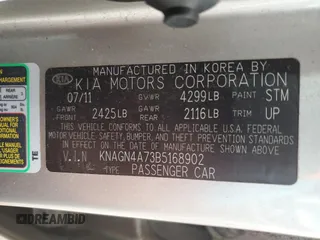 2011 Kia Optima EX z VIN KNAGN4A73B5168902, wystawiony jako Copart lot #59569365 z przebiegiem 160 297 mil mil oraz Szkoda całkowita • Salvage title. Historia ofert i sprzedaży dostępna na DreamBid. Obrazek 12.