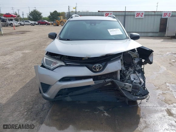 2018 Toyota RAV4 LE with VIN 2T3ZFREV2JW464807, listed as a IAAI auction lot 40966277 with 113,053 mi miles. Bid and sale history available at carsss.com. Image 13.