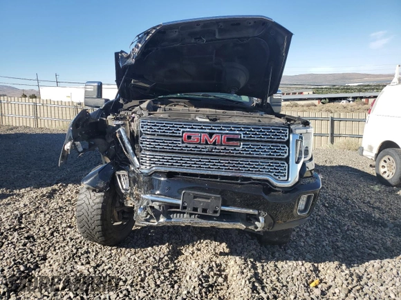 2021 GMC Sierra 3500HD Denali z VIN 1GT49WEY3MF296109, wystawiony jako Copart lot #67886764 z przebiegiem Nie podano mil oraz Szkoda całkowita • Salvage title. Historia ofert i sprzedaży dostępna na DreamBid. Obrazek 5.