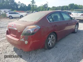2009 Nissan Altima S with VIN 1N4AL21E59N498848, listed as a IAAI auction lot 42123097 with 132,913 mi miles and . Bid and sale history available at DreamBid. Image 4.