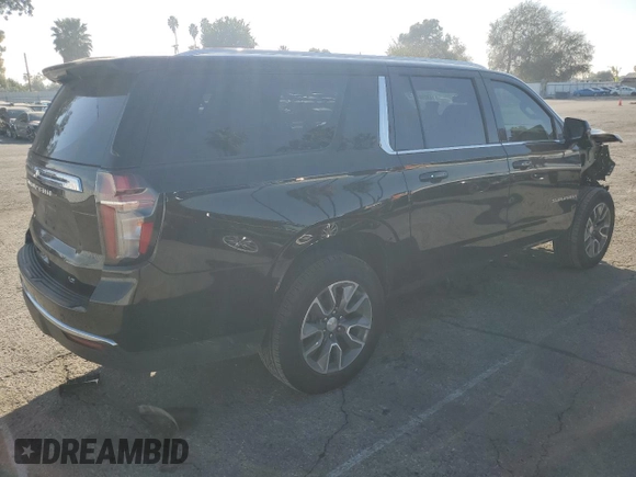 2023 Chevrolet Suburban LT with VIN 1GNSCCKD1PR124986, listed as a Copart auction lot 87432904 with 105,026 mi miles and Salvage Title. Bid and sale history available at DreamBid. Image 3.