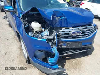 2020 Ford Edge SEL z VIN 2FMPK4J98LBA07595, wystawiony jako IAAI lot #42068572 z przebiegiem 105 352 mil mil oraz . Historia ofert i sprzedaży dostępna na DreamBid. Obrazek 6.