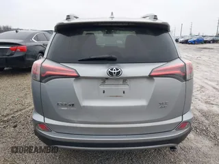 2018 Toyota RAV4 XLE with VIN 2T3RFREV1JW842728, listed as a IAAI auction lot 41519668 with 149,670 mi miles. Bid and sale history available at carsss.com. Image 16.