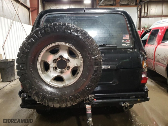1996 Toyota Land Cruiser with VIN JT3HJ85J0T0131986, listed as a Copart auction lot 49455575 with 281,291 mi miles and Salvage Title. Bid and sale history available at carsss.com. Image 6.