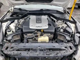 2015 Infiniti Q50 Premium z VIN JN1BV7AR9FM396109, wystawiony jako Copart lot #58215035 z przebiegiem 134 482 mil mil oraz Szkody całkowita. Historia ofert i sprzedaży dostępna na DreamBid. Obrazek 11.