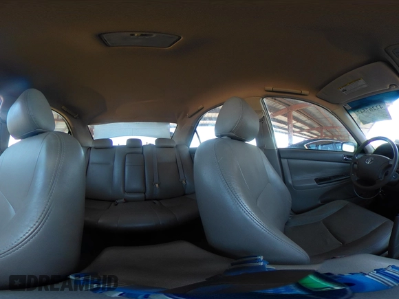 2006 Toyota Camry LE z VIN 4T1BF32K86U635925, wystawiony jako IAAI lot #42267547 z przebiegiem 162 593 mil mil oraz . Historia ofert i sprzedaży dostępna na DreamBid. Obrazek 18.