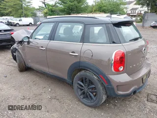 2014 MINI Countryman S with VIN WMWZC5C55EWP41717, listed as a IAAI auction lot 42324347 with Not provided miles and . Bid and sale history available at DreamBid. Image 3.
