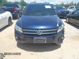 2012 Volkswagen Tiguan SE with VIN WVGAV7AX7CW534703, listed as a IAAI auction lot 42463358 with 119,699 mi miles and . Bid and sale history available at DreamBid. Image 12.