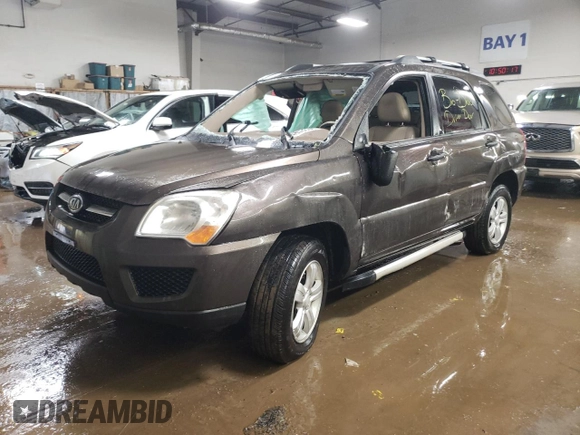 2009 Kia Sportage LX with VIN KNDJF724997571437, listed as a Copart auction lot 51460335 with 161,468 mi miles and Salvage Title. Bid and sale history available at carsss.com. Image 1.