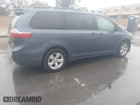 2015 Toyota Sienna LE AAS with VIN 5TDKK3DC8FS645154, listed as a IAAI auction lot 41513731 with 120,368 mi miles. Bid and sale history available at carsss.com. Image 4.