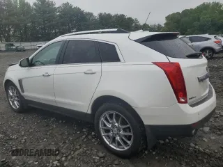 2013 Cadillac SRX Performance Collection with VIN 3GYFNHE34DS597871, listed as a Copart auction lot 56470795 with 208,504 mi miles and Salvage title. Bid and sale history available at DreamBid. Image 2.