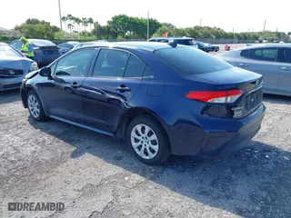2024 Toyota Corolla Hybrid LE with VIN JTDBCMFE4RJ021466, listed as a IAAI auction lot 41976149 with 21,965 mi miles. Bid and sale history available at carsss.com. Image 3.