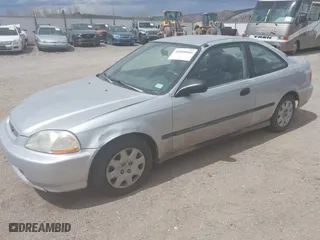 1998 Honda Civic DX with VIN 1HGEJ6229WL131263, listed as a IAAI auction lot 42050060 with 144,337 mi miles. Bid and sale history available at carsss.com. Image 2.