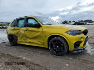2016 BMW X5 M z VIN 5YMKT6C51G0R77692, wystawiony jako Copart lot #81979013 z przebiegiem 56 774 mil mil oraz . Historia ofert i sprzedaży dostępna na DreamBid. Obrazek 4.