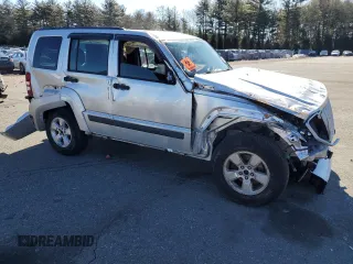 2012 Jeep Liberty Sport with VIN 1C4PJMAK8CW211242, listed as a Copart auction lot 47434565 with 112,723 mi miles and Salvage Title. Bid and sale history available at DreamBid. Image 4.