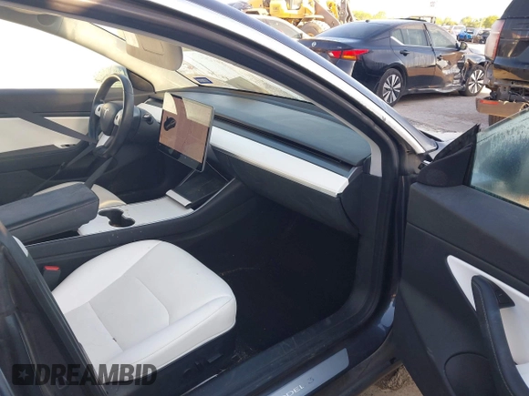 2018 Tesla Model 3 Long Range Battery with VIN 5YJ3E1EB0JF170215, listed as a IAAI auction lot 41969004 with 81,704 mi miles and . Bid and sale history available at DreamBid. Image 5.