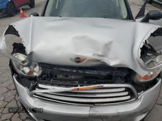 2012 MINI Countryman with VIN WMWZB3C5XCWM06778, listed as a Copart auction lot 61201285 with 64,676 mi miles and Salvage title. Bid and sale history available at DreamBid. Image 11.