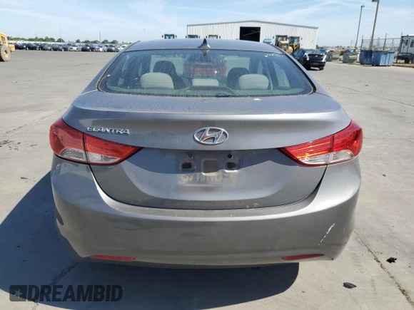 2013 Hyundai Elantra GLS z VIN 5NPDH4AE2DH408598, wystawiony jako Copart lot #56076665 z przebiegiem 136 305 mil mil oraz Szkoda całkowita • Salvage title. Historia ofert i sprzedaży dostępna na DreamBid. Obrazek 6.