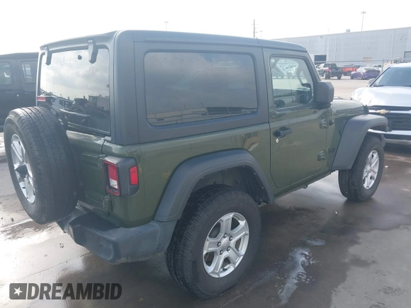 2021 Jeep Wrangler Sport with VIN 1C4GJXAN5MW852653, listed as a IAAI auction lot 42073214 with 53,834 mi miles and . Bid and sale history available at DreamBid. Image 4.