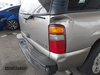 2002 Chevrolet Tahoe LS with VIN 1GNEC13T62R311933, listed as a IAAI auction lot 41895509 with 236,603 mi miles and . Bid and sale history available at DreamBid. Image 6.