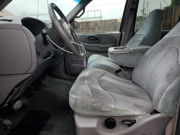 2001 Ford F-150 XLT with VIN 1FTRW07WX1KE51166, listed as a Copart auction lot 60164025 with 157,035 mi miles and Salvage title. Bid and sale history available at DreamBid. Image 7.
