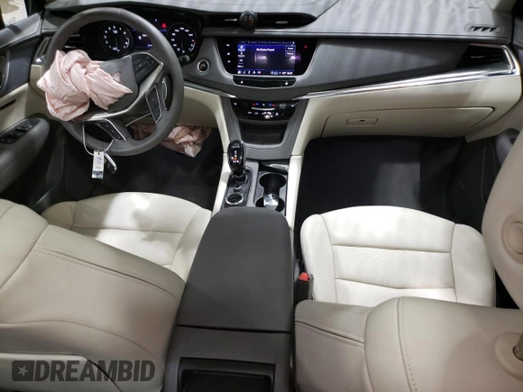 2023 Cadillac XT5 AWD Premium Luxury with VIN 1GYKNDRS5PZ221261, listed as a Copart auction lot 52779565 with 7,098 mi miles and Salvage Title. Bid and sale history available at DreamBid. Image 8.