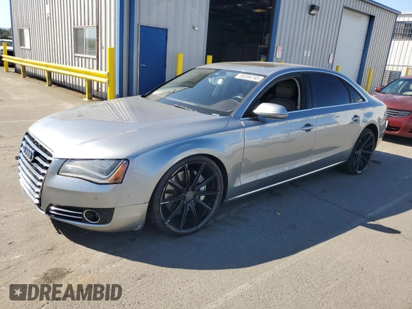 2012 Audi A8 z VIN WAURVAFD7CN023286, wystawiony jako Copart lot #56594745 z przebiegiem 199 443 mil mil oraz Czysty tytuł • Clean title. Historia ofert i sprzedaży dostępna na DreamBid. Obrazek 1.