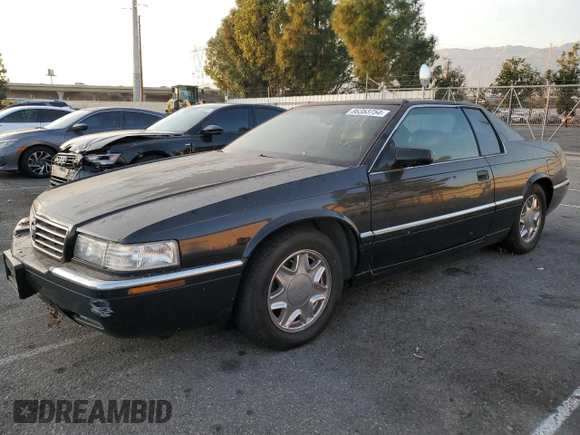 1999 Cadillac Eldorado ESC with VIN 1G6EL12Y8XU614645, listed as a Copart auction lot 86353754 with 151,243 mi miles and Clean Title. Bid and sale history available at DreamBid. Image 1.