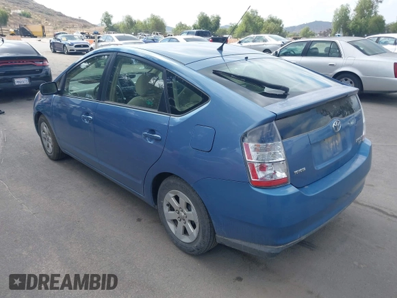 2005 Toyota Prius with VIN JTDKB20U957040822, listed as a IAAI auction lot 42129542 with 214,455 mi miles. Bid and sale history available at carsss.com. Image 3.
