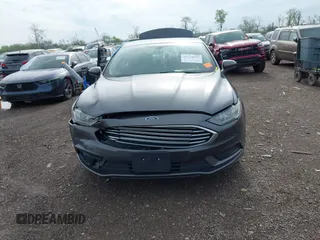 2017 Ford Fusion SE with VIN 3FA6P0H76HR411928, listed as a IAAI auction lot 42124817 with 88,184 mi miles and . Bid and sale history available at DreamBid. Image 12.
