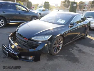 2015 Tesla Model S 85D with VIN 5YJSA1H46FF096603, listed as a IAAI auction lot 41084296 with 114,466 mi miles. Bid and sale history available at carsss.com. Image 6.