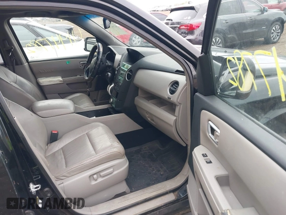 2009 Honda Pilot Touring with VIN 5FNYF48959B016978, listed as a IAAI auction lot 41947782 with 234,115 mi miles and . Bid and sale history available at carsss.com. Image 5.