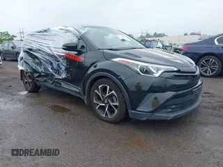 2018 Toyota C-HR XLE with VIN JTNKHMBX6J1000904, listed as a IAAI auction lot 42513117 with 77,192 mi miles and . Bid and sale history available at DreamBid. Image 1.