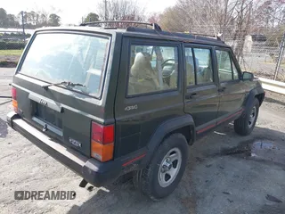 1996 Jeep Cherokee Sport with VIN 1J4FJ68S1TL204870, listed as a IAAI auction lot 41726962 with 93,462 mi miles. Bid and sale history available at carsss.com. Image 4.