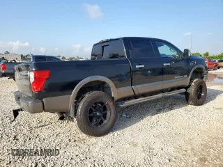 2017 Nissan Titan Platinum Reserve with VIN 1N6BA1F43HN568650, listed as a Copart auction lot 59593525 with 126,193 mi miles and Salvage title. Bid and sale history available at DreamBid. Image 3.
