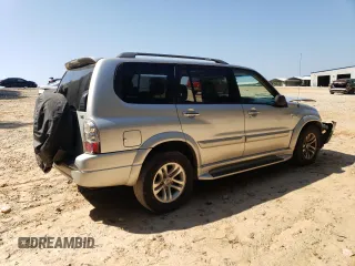 2006 Suzuki XL7 z VIN JS3TY92V064102548, wystawiony jako Copart lot #68875654 z przebiegiem 261 711 mil mil oraz Szkoda całkowita • Salvage title. Historia ofert i sprzedaży dostępna na DreamBid. Obrazek 3.
