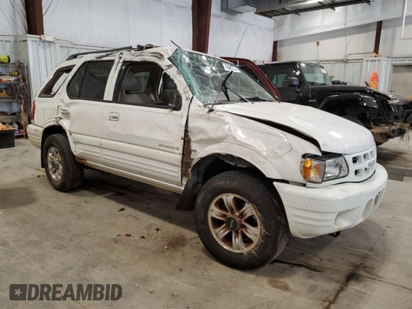 2001 Isuzu Rodeo S with VIN 4S2CK58W114324439, listed as a Copart auction lot 70426714 with Not Provided miles and Non Repairable. Bid and sale history available at DreamBid. Image 4.