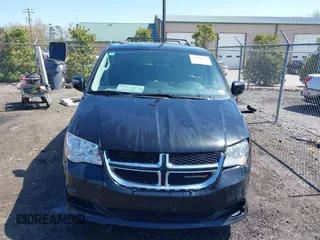 2015 Dodge Grand Caravan SXT with VIN 2C4RDGCG6FR548774, listed as a IAAI auction lot 41901232 with 141,589 mi miles and . Bid and sale history available at DreamBid. Image 13.