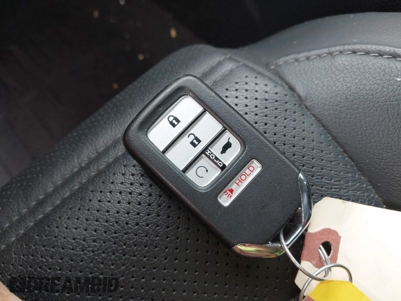2021 Honda CR-V Touring with VIN 7FART6H91ME022993, listed as a IAAI auction lot 42439344 with 30,477 mi miles and . Bid and sale history available at DreamBid. Image 11.