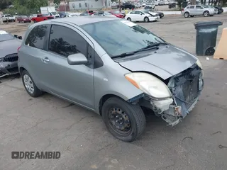 2007 Toyota Yaris with VIN JTDJT923675117537, listed as a IAAI auction lot 42116893 with 210,036 mi miles. Bid and sale history available at carsss.com. Image 1.