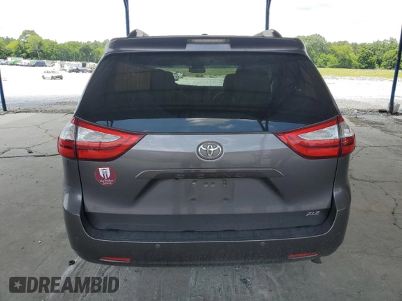2015 Toyota Sienna XLE с VIN 5TDYK3DC0FS630013, выставлен на аукционе Copart как лот 60044955 с пробегом 124 063 миль миль и Списание • Salvage title. История ставок и продаж доступна на DreamBid. Изображение 6.