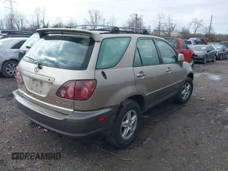 1999 Lexus RX 300 Luxury SUV with VIN JT6HF10U6X0054124, listed as a IAAI auction lot 41566201 with 220,462 mi miles. Bid and sale history available at carsss.com. Image 4.