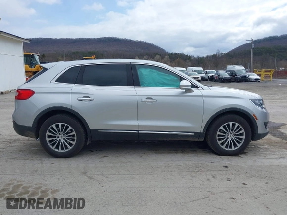 2016 Lincoln MKX Select with VIN 2LMTJ8KR6GBL59043, listed as a IAAI auction lot 41892601 with 113,756 mi miles. Bid and sale history available at carsss.com. Image 13.