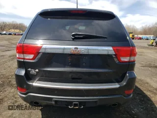 2013 Jeep Grand Cherokee Overland with VIN 1C4RJFCT2DC576125, listed as a Copart auction lot 52595165 with 100,361 mi miles and Salvage Title. Bid and sale history available at carsss.com. Image 6.