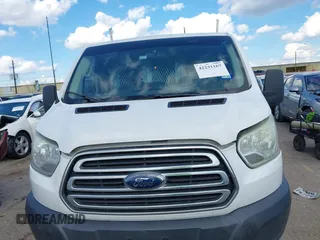 2015 Ford Transit Cargo z VIN 1FTNR1ZM3FKB02963, wystawiony jako IAAI lot #42231167 z przebiegiem 181 270 mil mil oraz . Historia ofert i sprzedaży dostępna na DreamBid. Obrazek 12.
