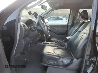 2011 Nissan Frontier Pro-4X with VIN 1N6AD0EV8BC427339, listed as a Copart auction lot 88293455 with 99,856 mi miles and Salvage title. Bid and sale history available at DreamBid. Image 7.