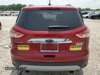 2015 Ford Escape Titanium with VIN 1FMCU0JX5FUC90567, listed as a Copart auction lot 60340775 with 67,287 mi miles and Salvage title. Bid and sale history available at DreamBid. Image 6.